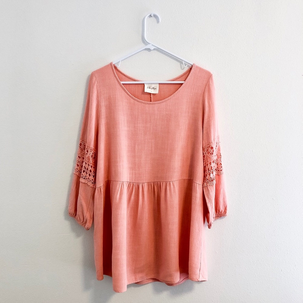 Peplum top with crochet sleeve detail